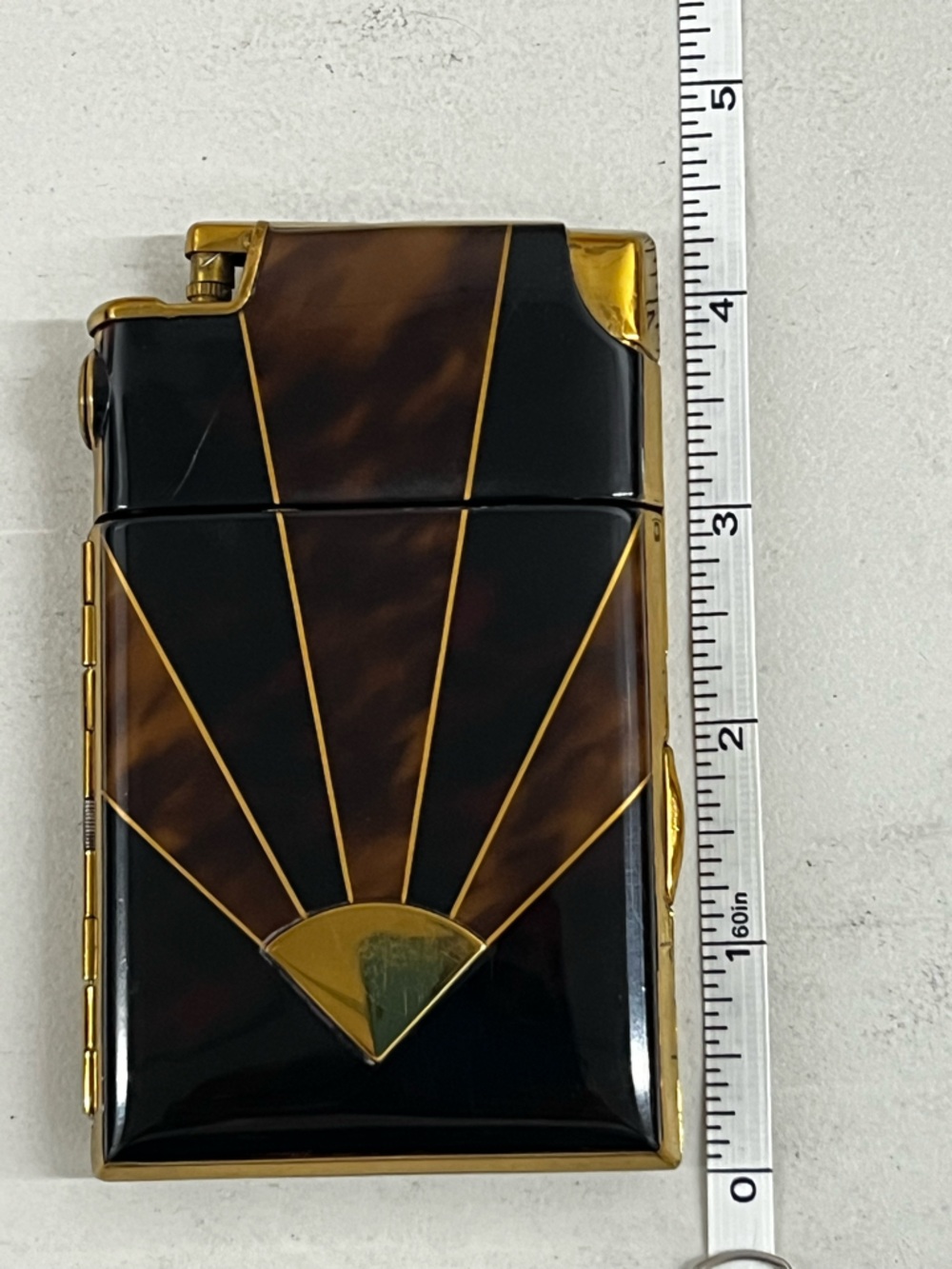 Gold & Tortoiseshell - cigarette case and lighter.